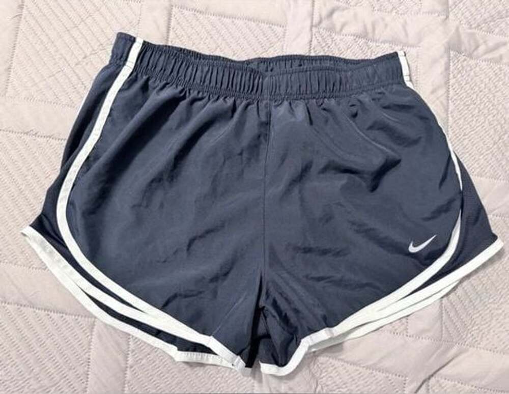 NWOT Woman’s Nike Navy and White Athletic Running Shorts size M